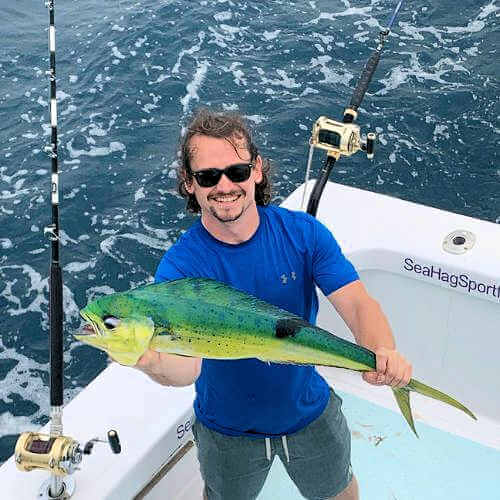 Man Holding Mahi OBX